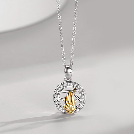 Pair of Sun and Moon Necklace With Gold Wing in Sterling Silver