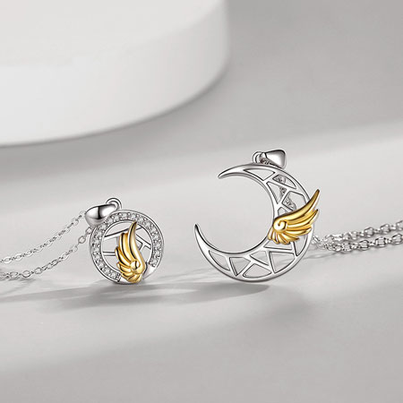 Pair of Sun and Moon Necklace With Gold Wing in Sterling Silver