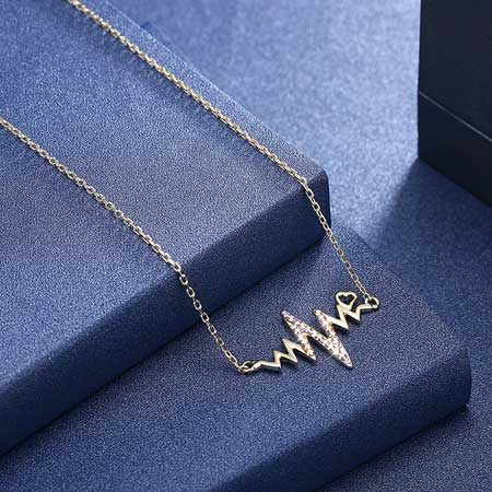 Silver and Gold Heartbeat Necklace in Sterling Silver